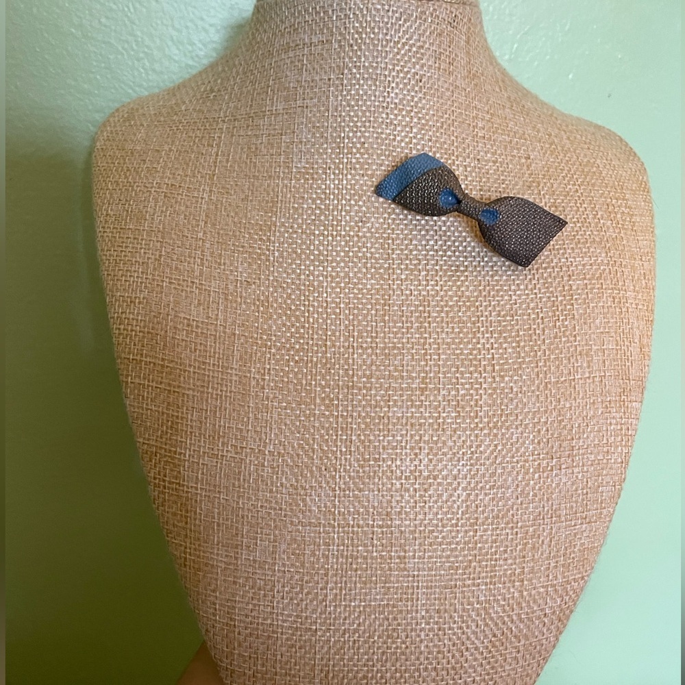 Elegant Black and Blue Bow Brooch
